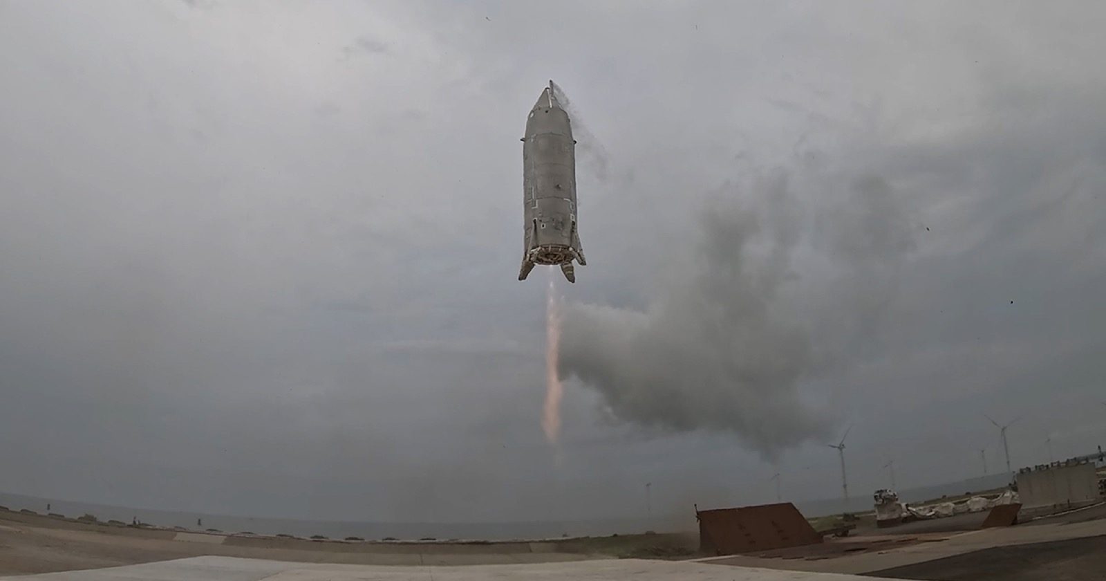 再使用ロケット実験機「RV-X」の飛行試験。着陸脚を出したまま空中で姿勢を保っている